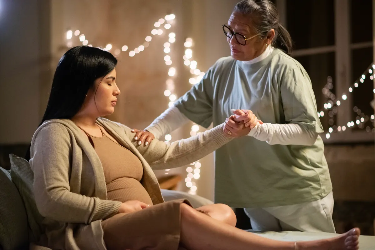 Doula supporting a mother during labor